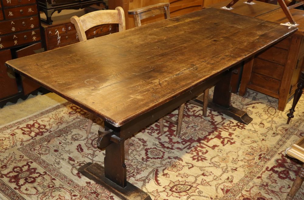 An oak refectory dining table, W.180cm, D.76cm, H.74cm